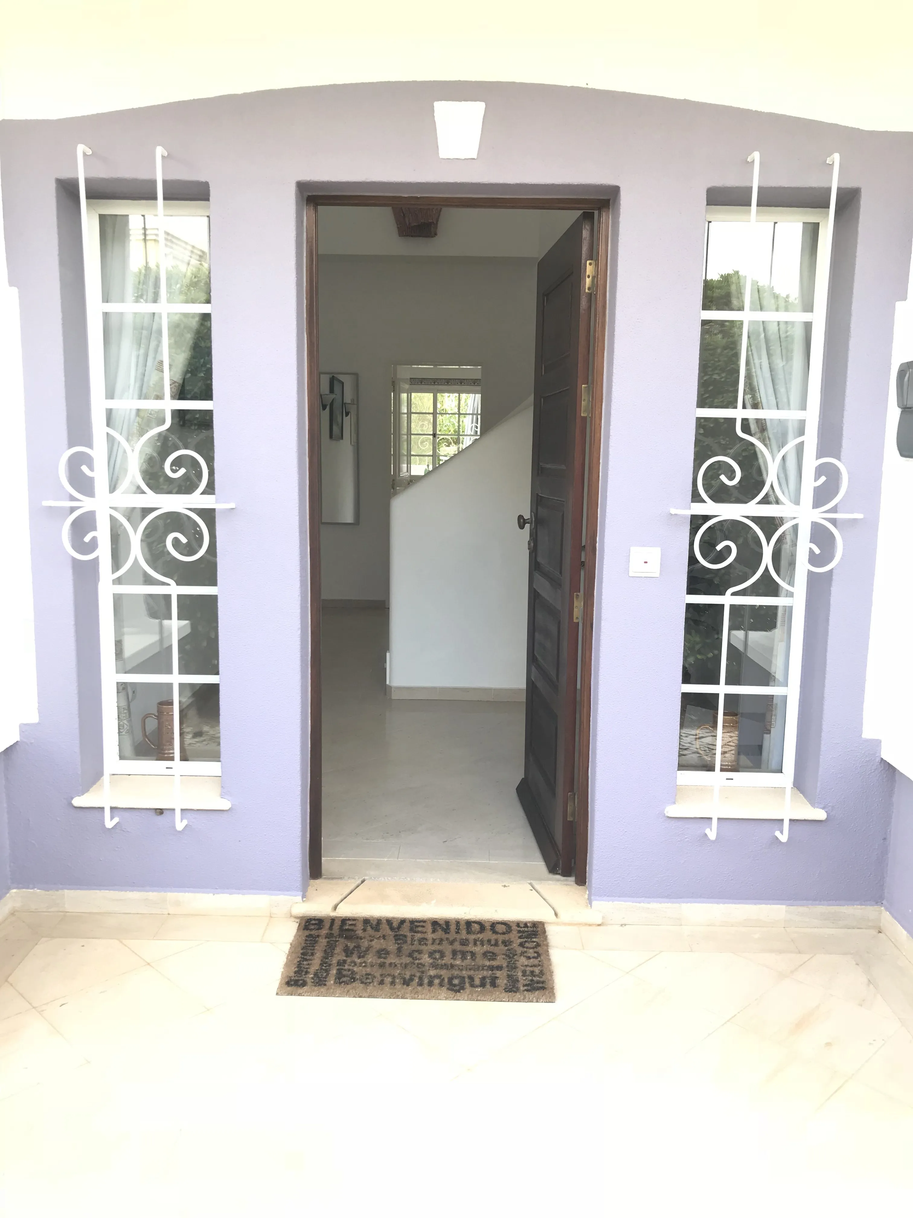 Main entrance to side of villa